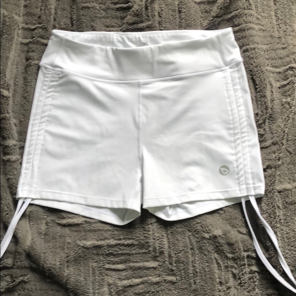 White athletic compression shorts